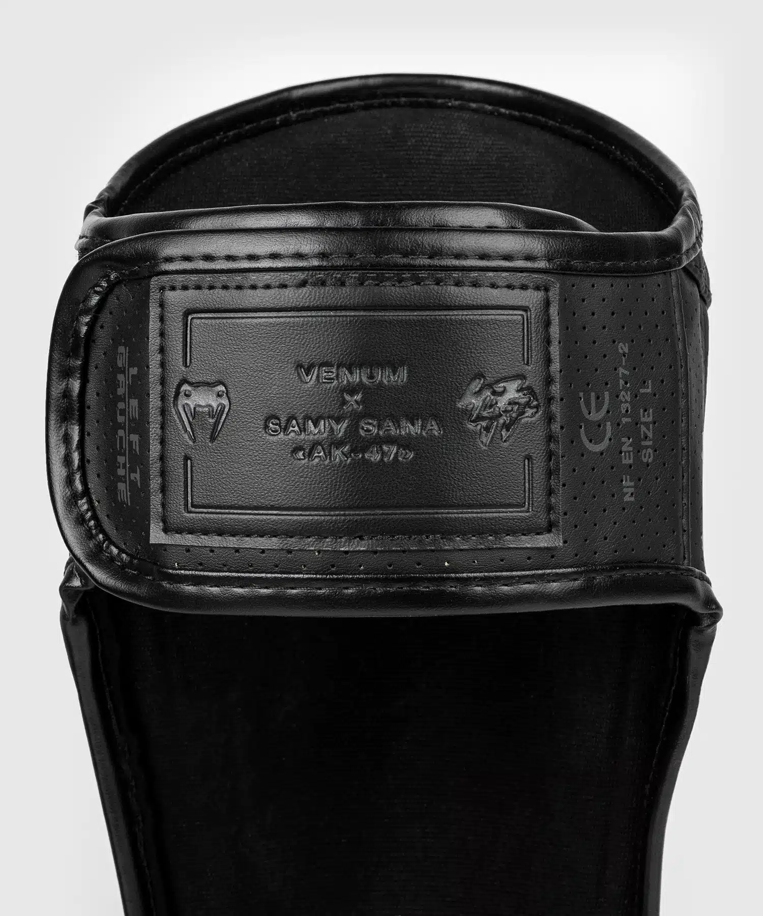 venum scheenbeschermers s47 zwart/oranje